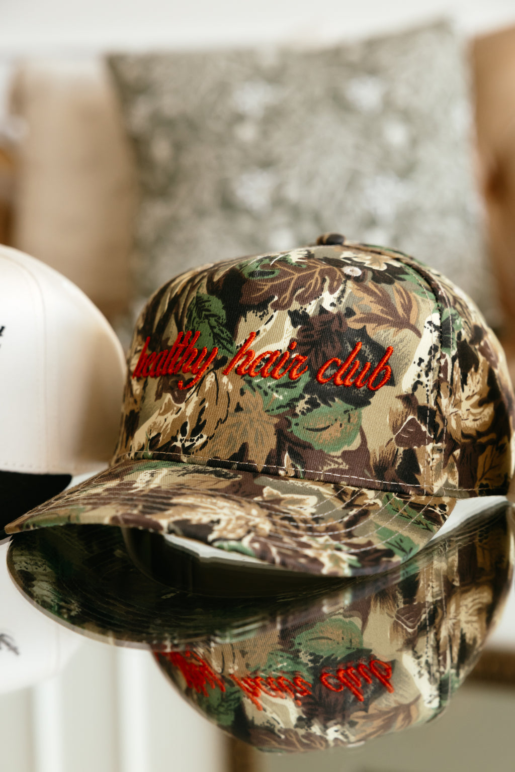 Healthy Hair Club Camo Trucker